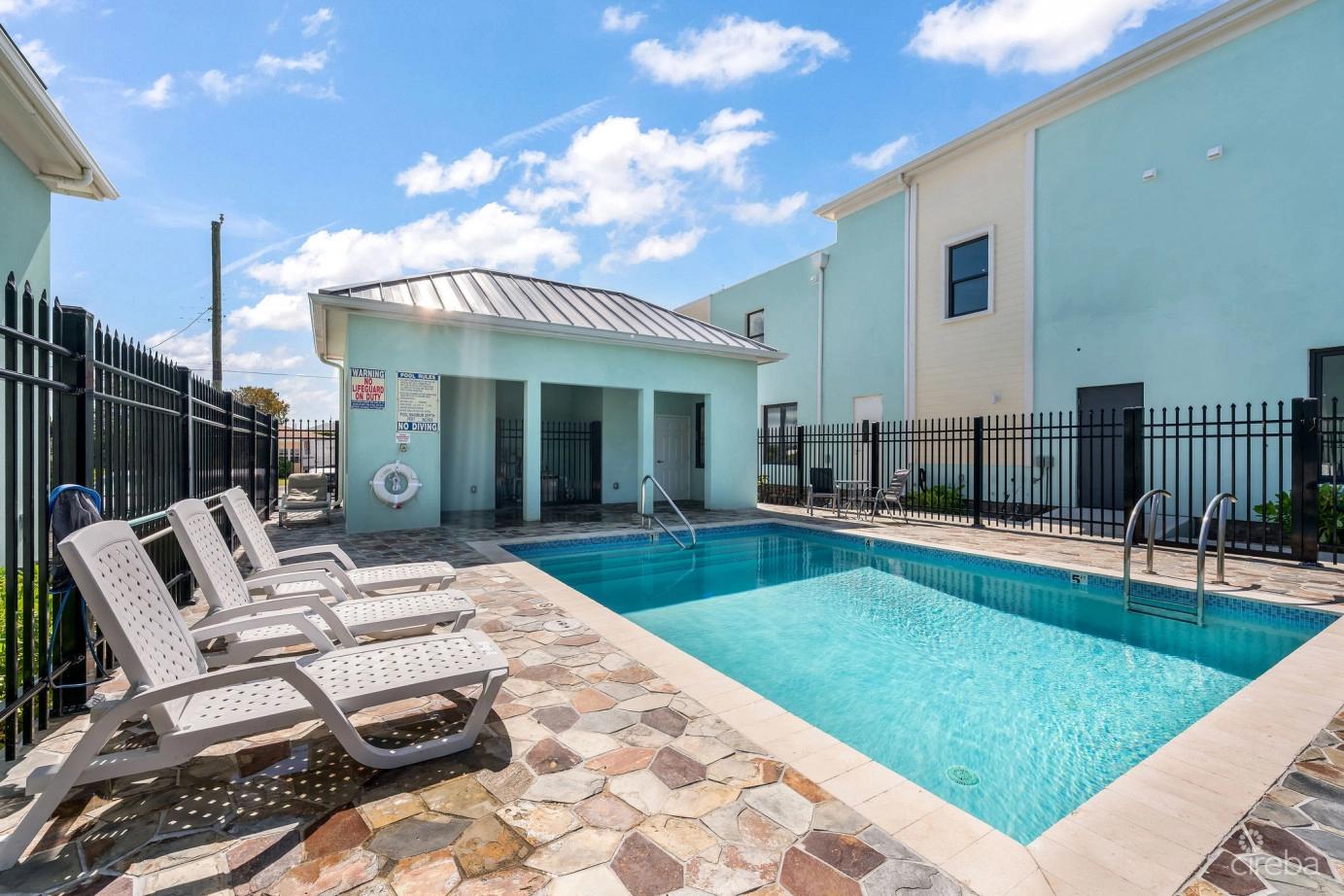 Income-producing Residential Portfolio --4 Studios In West Bay — photo 4