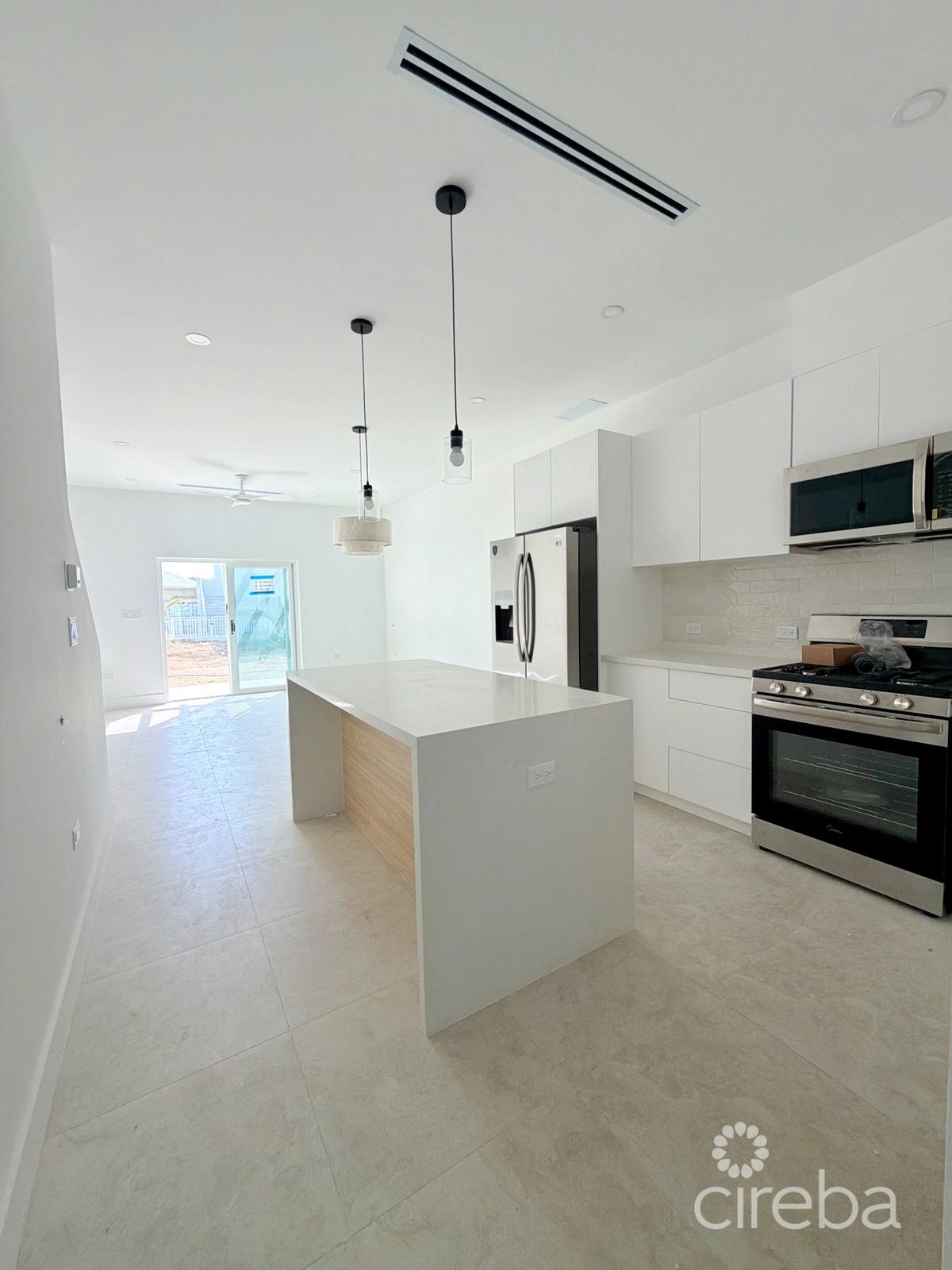 Three Bedroom, 3.5 Bathroom Residence - Developer Unit - The Meadows At Batabano — photo 2