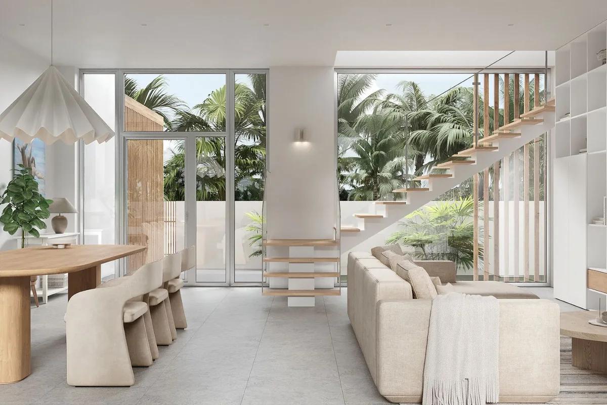 Artist’s rendering of a double-height living and dining room with a pale staircase and palms outside