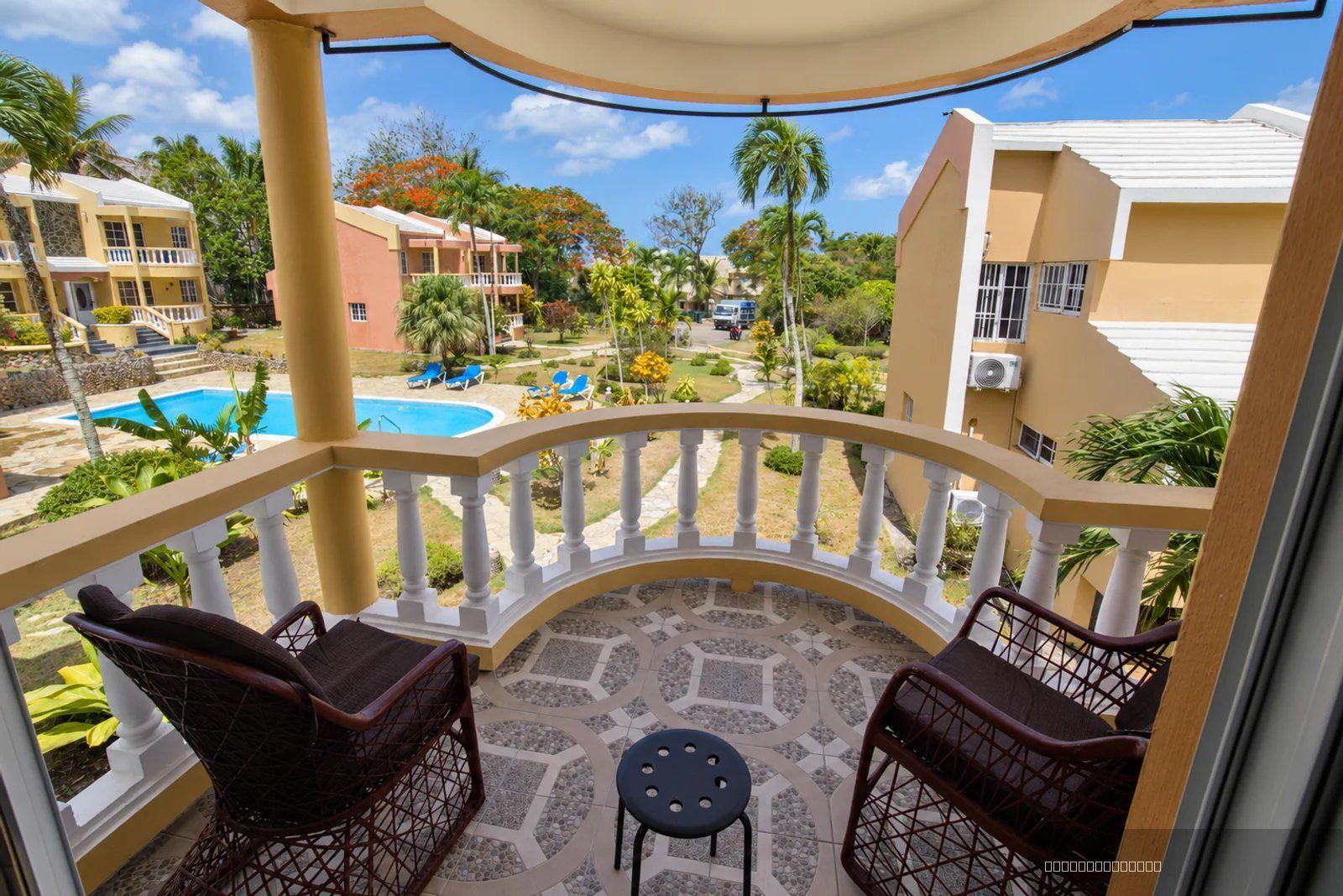 1-bedroom apartment in Sosua with two pool-view balconies — photo 2