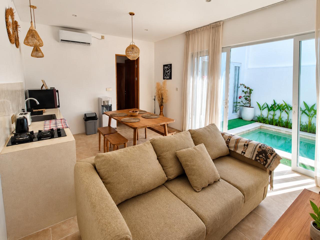 2-bedroom villa in Canggu with roof terrace and rice field view — photo 1