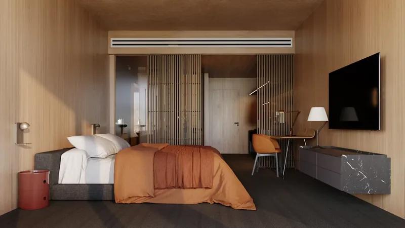 A timber-lined bedroom with terracotta bedding, a desk and a wall-mounted television