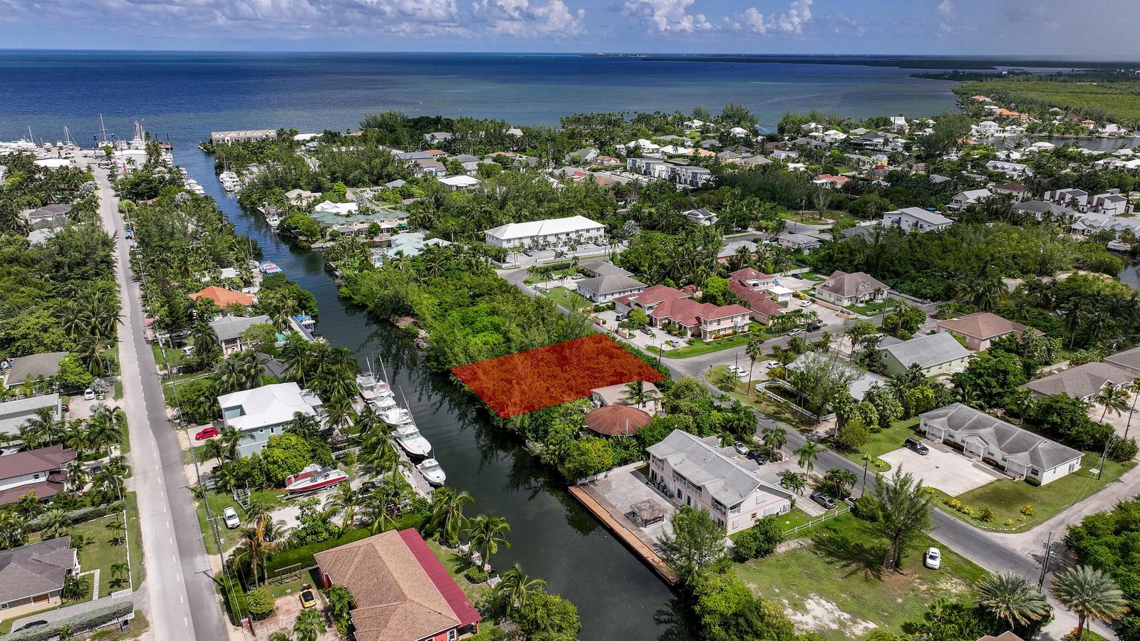 Omega Bay Canal Front Quarter-Acre Lot — photo 5