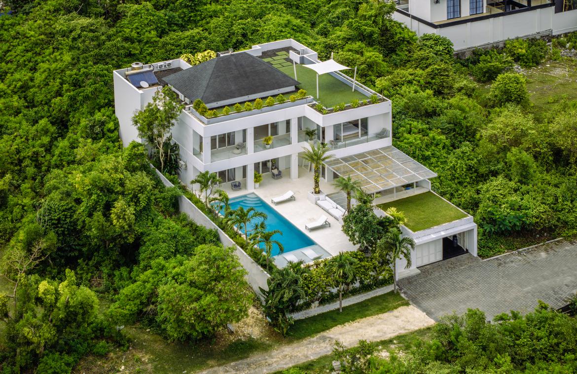 Luxury modern freehold villa with rooftop and Jimbaran Bay views in Jimbaran, Bali, Indonesia — photo 1