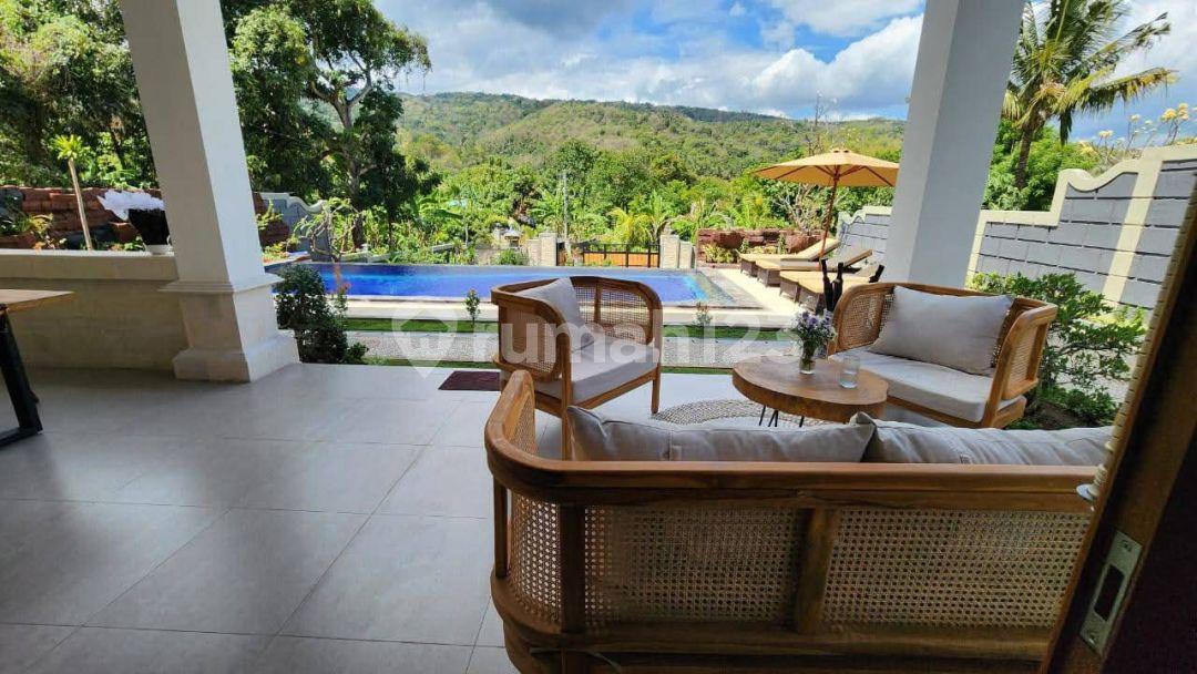 4-bedroom villa in Lovina with hill and rice field view — photo 1