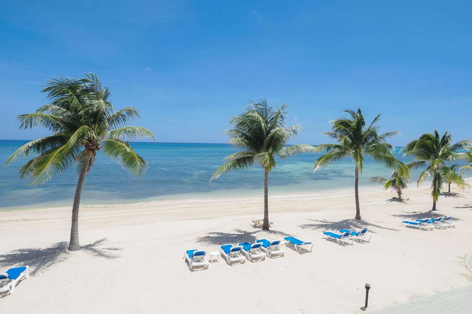 2 Bedroom Beachfront Condo for Sale, Castaways Cove 130, East End, Grand Cayman — photo 1