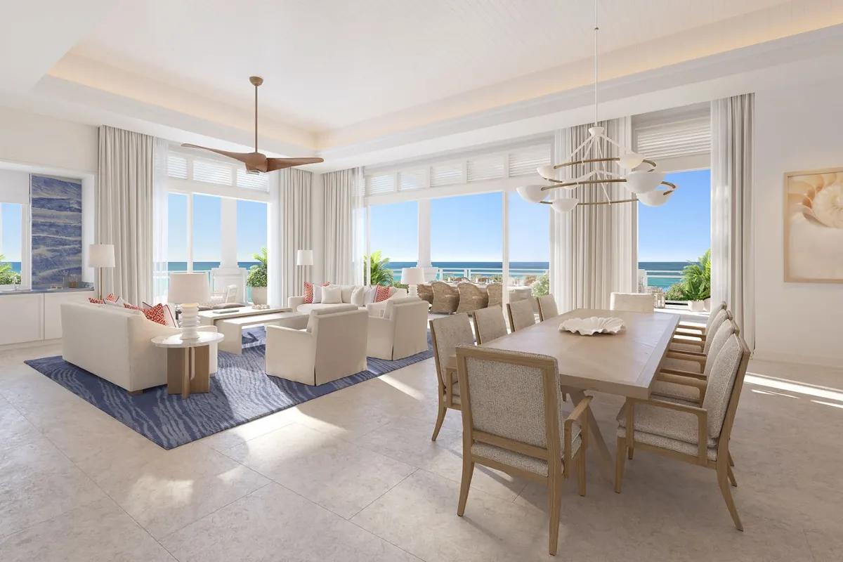 the open-plan living and dining room facing the ocean