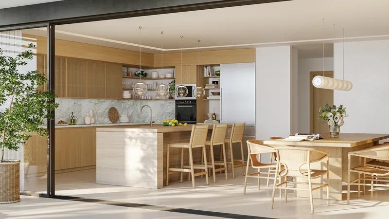 a timber kitchen and dining room opening to a terrace