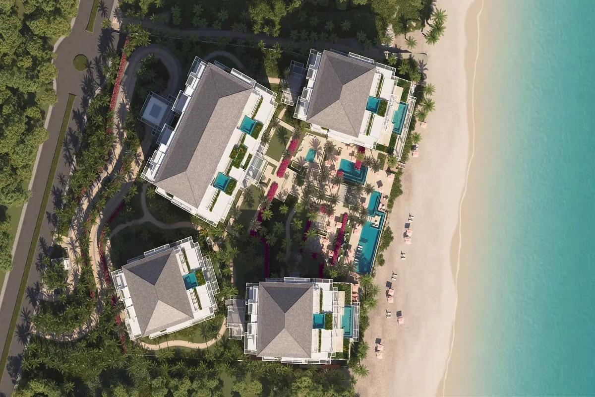 an overhead view of the residence buildings and the beach beyond