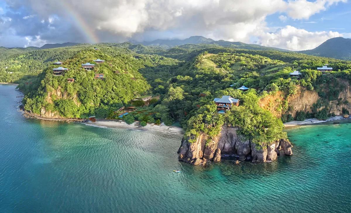 cOMPOSITE — same rainbow aerial masterplan image as OVERALL-PERSPECTIVE-2023 (real headland photo + CGI