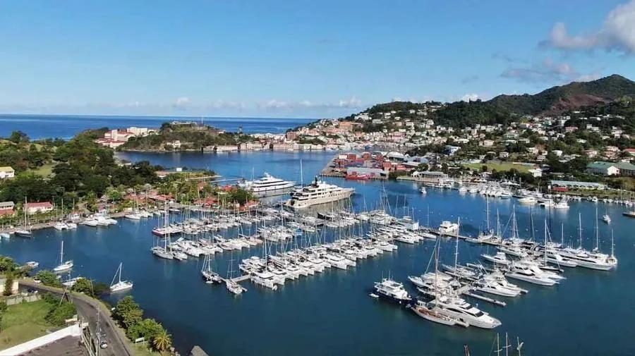 Yachts moored in the lagoon marina at St George's, Grenada, the town along the ridge behind